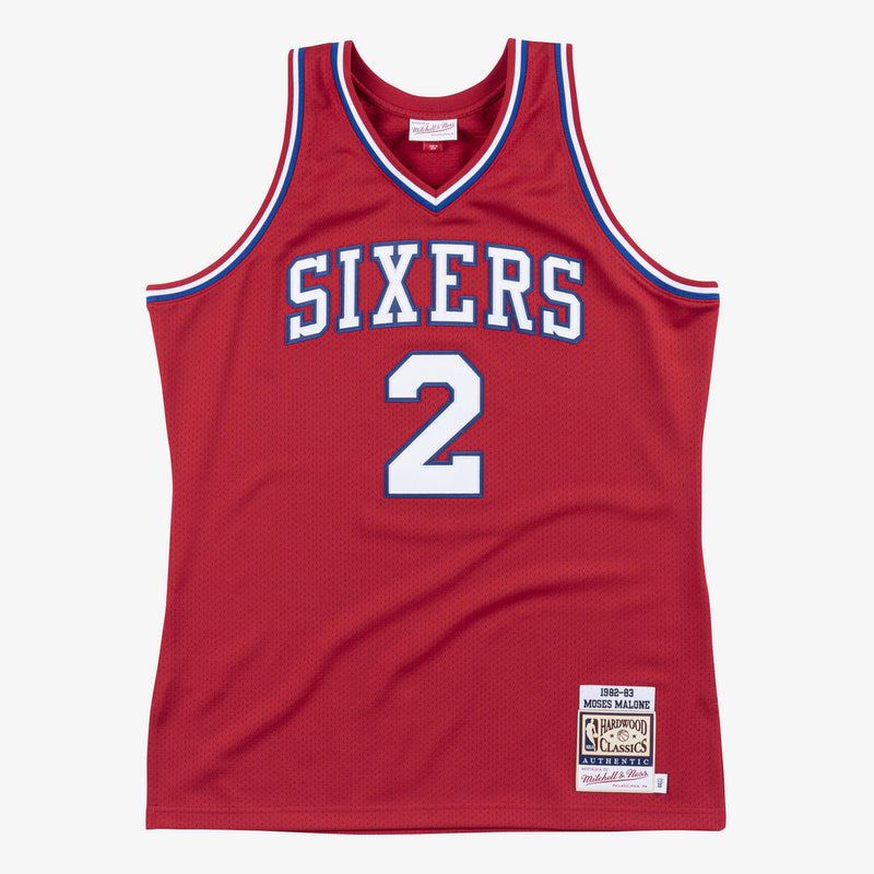 NBA AUTHENTIC JERSEY 76ERS 1982 MOSES MALONE - Scarlet - Image 1 NBA AUTHENTIC JERSEY 76ERS 1982 MOSES MALONE - Scarlet - Image 1